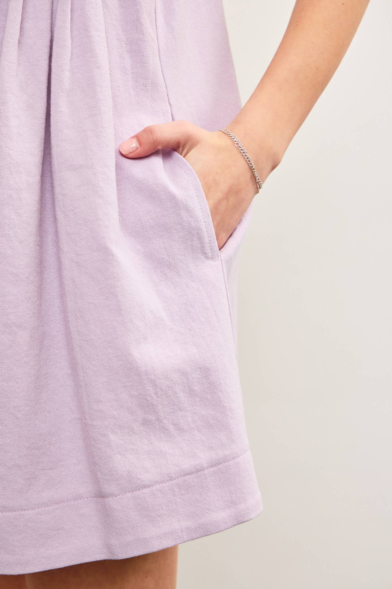 DEEP V NECK TIED FRONT PLEATED SLEEVELESS ROMPER